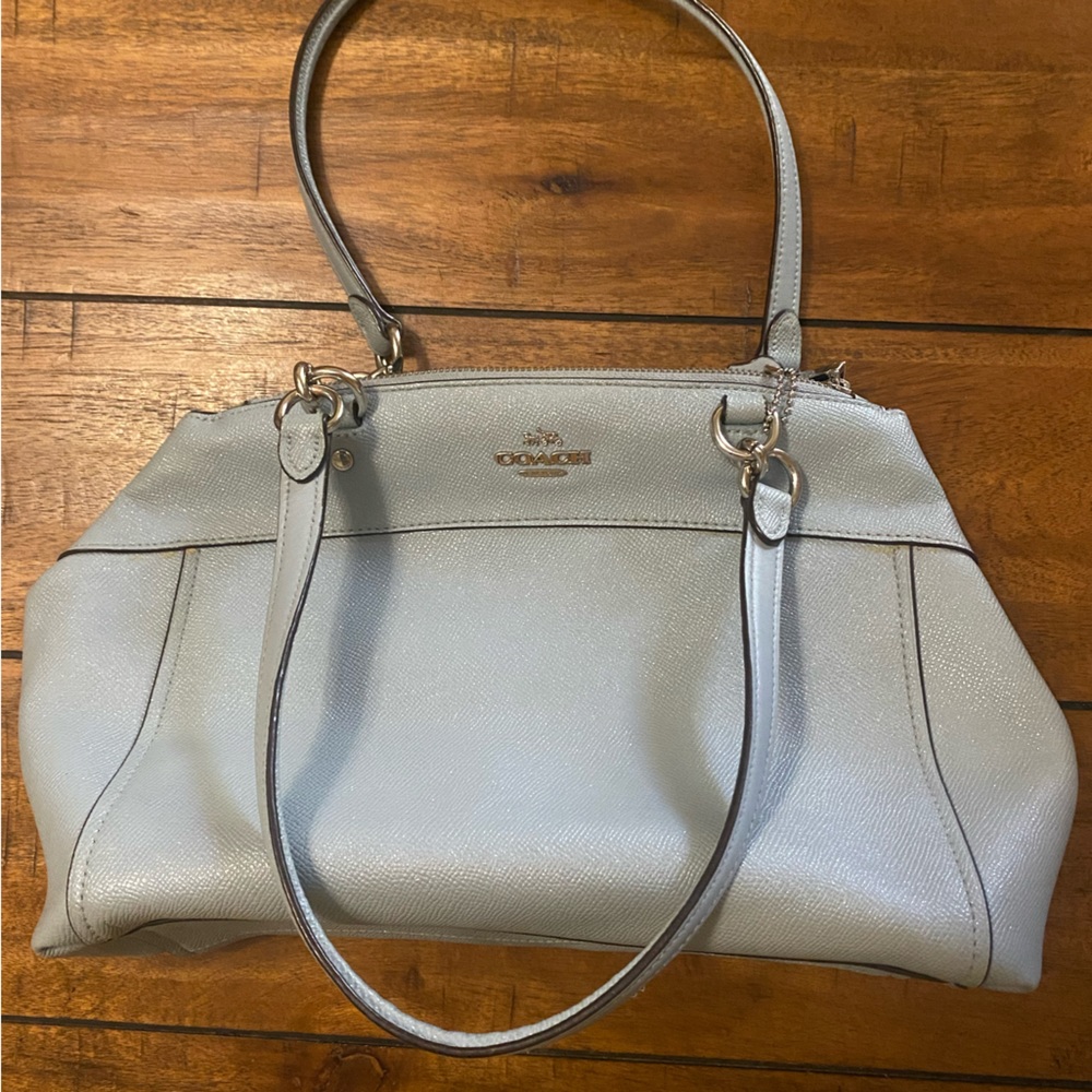 Beautiful blue shimmer coach bag
